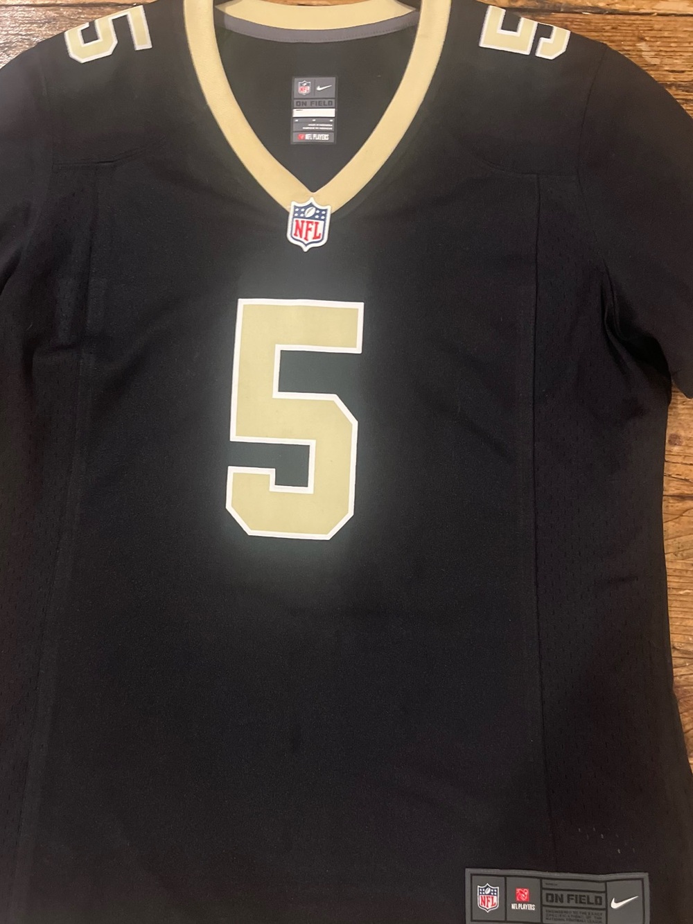Nike NFL Official Women's Black and Gold #5 Saints Jersey.